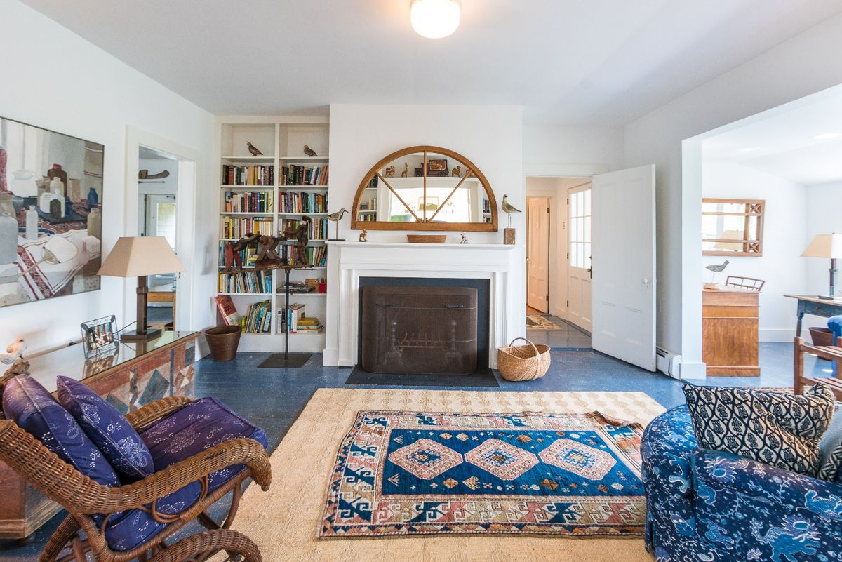 Library with cozy fireplace
