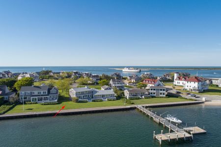Large main house, two car garage and private dock